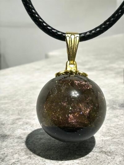 Collier boule en verre rose doré