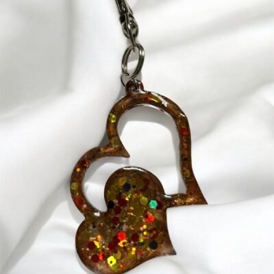 Porte clé double coeur doré