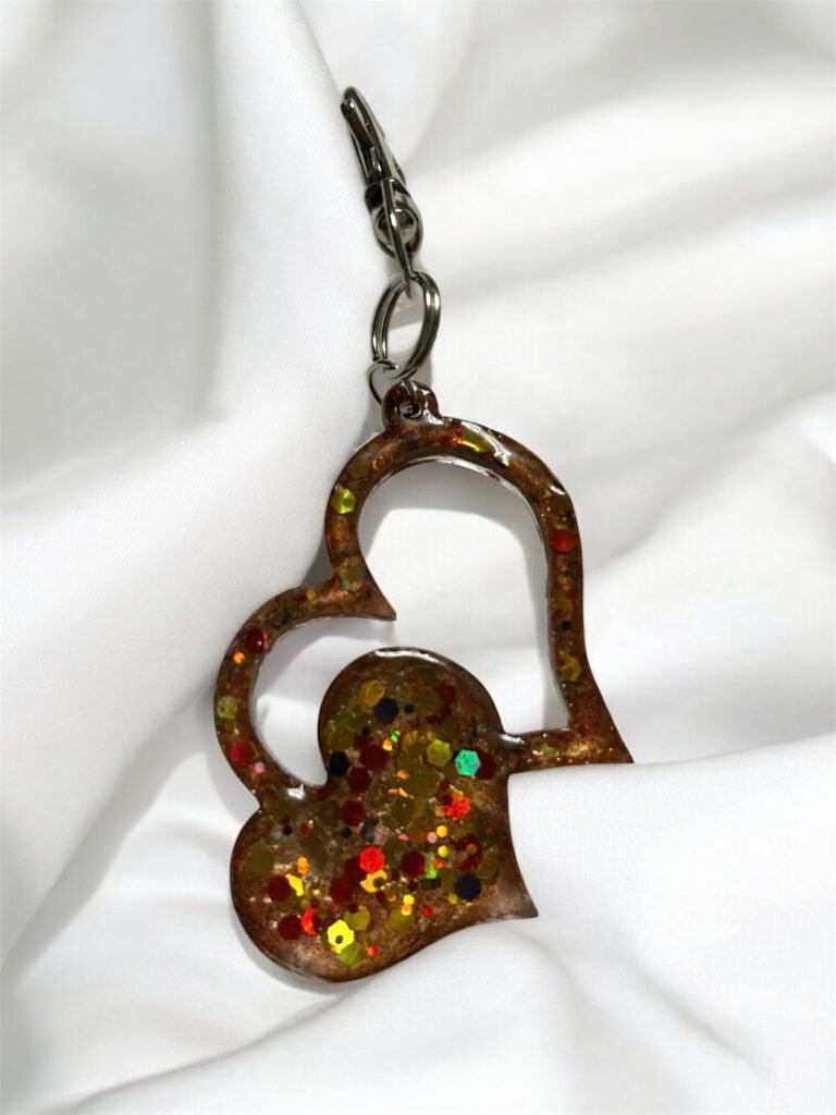 Porte clé double coeur doré